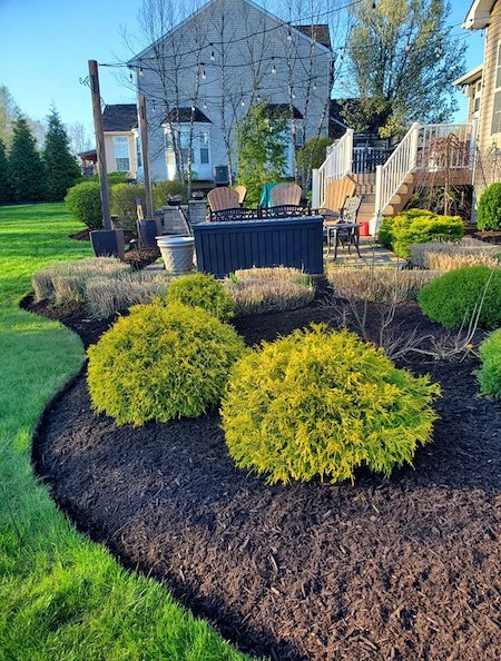 Designing an Outdoor Oasis: Combining Landscape Design, Mulching & Maintenance in Akron